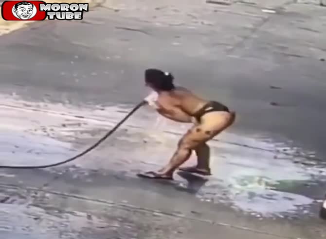 Video :She uses a yard hose to clean her toilet